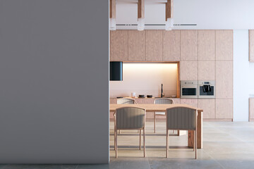 Front view of blank grey wall with place for image frame or poster in a modern kitchen interior with wooden dining table with chairs, mockup. 3D Rendering