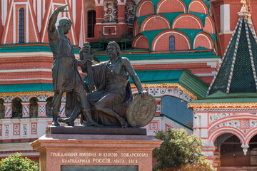 Fototapeta na wymiar Statue of Kuzma Minin and Dmitry Pozharsky in front of St. Basil's Cathedral - Red Square in Moscow, 2023.
