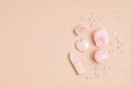 Healing reiki chakra crystals therapy. Alternative rituals with rose quartz for wellbeing, meditation, relaxation, mental health, spiritual practices. Energetical power concept