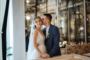 bride and groom inside a cocktail bar