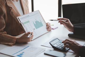 Business man group are meeting together in the office, they are meeting on the topic of finance and financial management, they are business partners. Concept financial management for startup companies