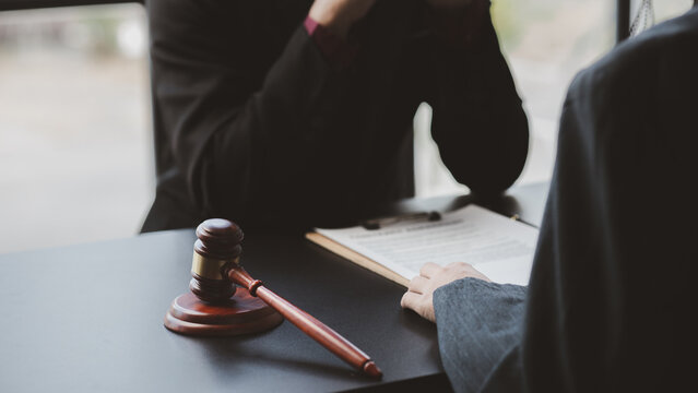 Attorneys or lawyers are advising clients in defamation cases, they are collecting evidence to bring charges against the parties for damages. The concept of defamation case counseling.