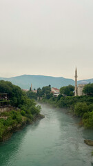 view of the fog over river in the evening in Mostar 