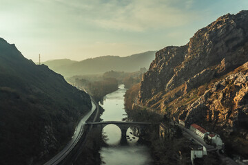 Fototapeta premium A bridge over a river in a vale