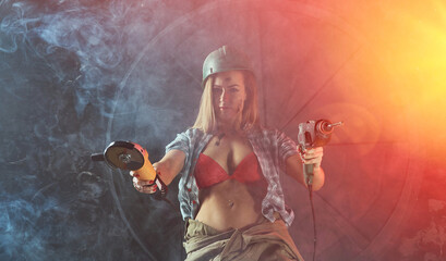 Beautiful girl in construction clothes