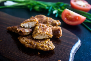 chicken meat in a crispy crust