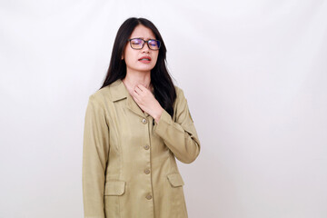Young pretty Asian woman in civil servant costume having problem on her throat