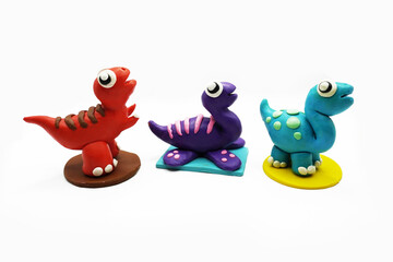 modeling clay, clay, dinosaur, animal, education, art, kid, white, colors, red, yellow, green, egg, tree, blue, purple
