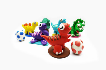 modeling clay, clay, dinosaur, animal, education, art, kid, white, colors, red, yellow, green, egg, tree, blue, purple