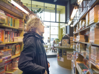 Fototapeta na wymiar bookstore,.buying a book in a store