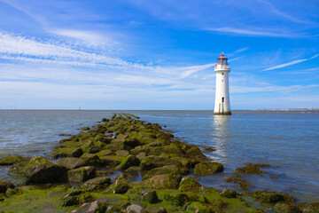 Fototapeta na wymiar Lighthouse at Sea