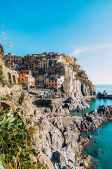 Fototapeta na wymiar Manarola is one of the most beautiful and charming towns in the Cinque Terre, especially from this view of the colorful houses