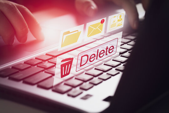 Deleting documents, spam mail, electronic messages or personal information in computer system. concept of technology and document management from laptop