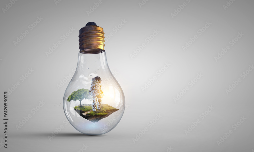 Canvas Prints spaceman inside light bulb . mixed media