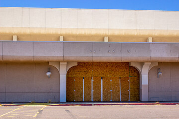 Boarded Up Doorway On Failed Department Store