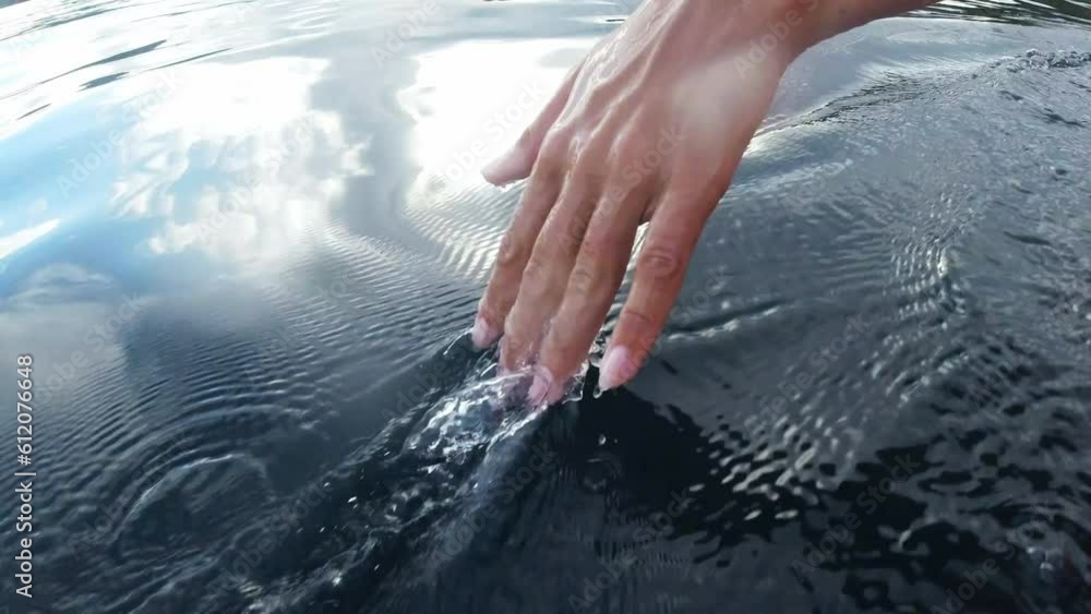 Poster Closeup ocean, holiday and hand in water for happiness, relax and feeling the sea. Earth, relaxing and person touching a river or lake on a vacation by the beach with fingers for leisure and carefree