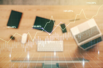 Abstract creative financial graph on modern laptop background, financial and trading concept. Multiexposure