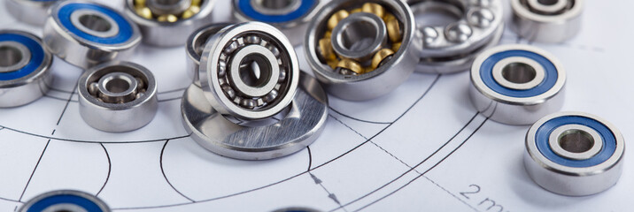 bearings of different types, micrometer, caliper and ruler on the drawings of technical products....