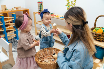 Mother holding basket of first wooden montessori toys