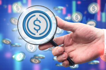 US dollar symbol. USD logo under magnifying glass. Hand with loupe. Dollar currency analysis. USD coins. Financial analytics. Concept of income and expense analysis. USD money currency