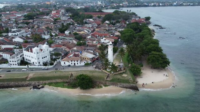 Aerial drone footage of Galle fort and lighthouse in Sri Lanka 