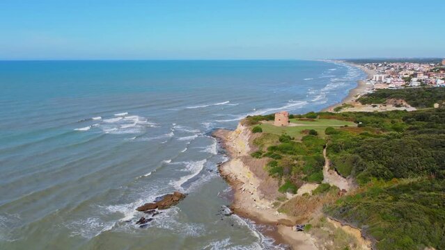 Tor di Caldano old tower in Anzio, near Rome, Italy. Beach and sea