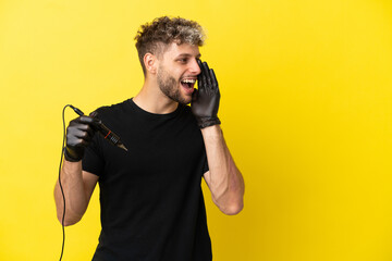 Tattoo artist caucasian man isolated on yellow background shouting with mouth wide open to the side