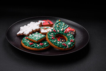 Delicious fresh colorful Christmas or New Year gingerbread cookies