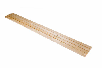 Four wooden boards with holes drilled in the ends