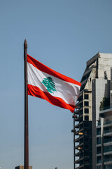 The Lebanese flag in the center of Beirut fluttering in the wind