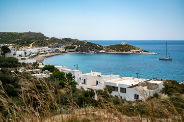 Bay of Kapsali on the Greek island of Kythira with blue water and sailing boats