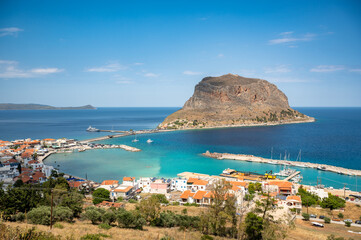 Fototapeta na wymiar Old town of Monemvasia in Greece in the Peloponnese on a sunny day with blue water