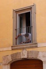 Person cleaning a window