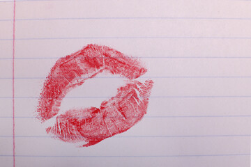kiss print with red lipstick on white sheet