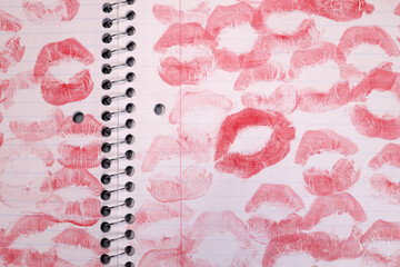 Notebook with lipstick kiss marks