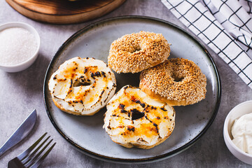 Sweet creme brulee bagels with cream cheese and caramelized sugar for breakfast