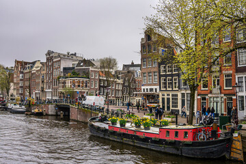 Fototapeta premium The river and the city in Amsterdam, Netherlands