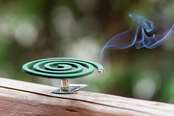 Smouldering repellent spiral from mosquitoes, protection against insects