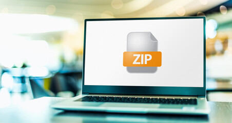 Laptop computer displaying the icon of ZIP file