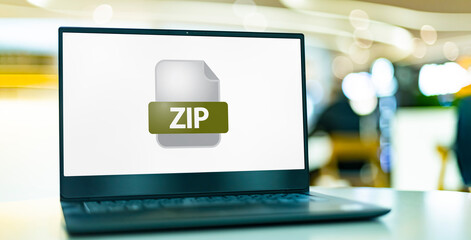 Laptop computer displaying the icon of ZIP file