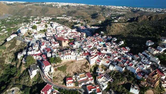 Aerial view above the beautiful Spanish village of Moj&aacute;car in Andalusia in southern Spain	