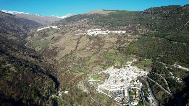 Aerial view above the beautiful village of Capileira in the gorge of the Poqueira in Andalusia Spain	
