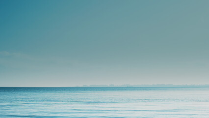 Silhouette of a city on the sea