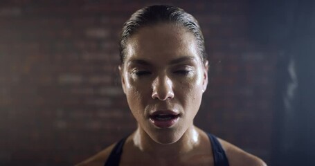 Tired, breathing or face of girl in gym for exercise workout for wellness in fitness center with resilience. Motivation, breathe or portrait of exhausted female sports athlete resting or sweating