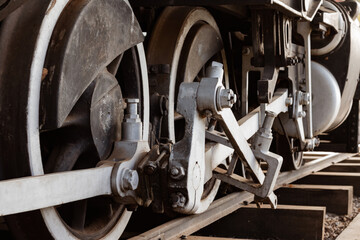 Photography of steam locomotive wheels.