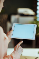 Closeup on modern woman with tablet PC blank screen