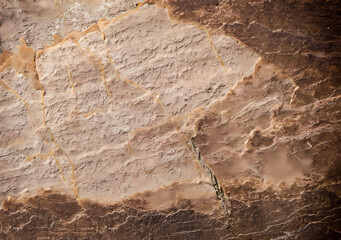 Stone background, rock wall backdrop with rough texture. Abstract, grungy and textured surface of stone material. Nature detail of rocks.