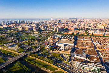 Obraz premium Aerial panoramic view of Sant Adria de Besos and Barcelona on Besos river with Mediterranean sea in background on sunny day, Spain