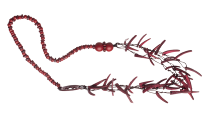 Colorful Tribal bead style necklet fly in air. Red Chilli color bead necklace as gemstone for fashion ornament decorative items. Fashion ornament necklace to add more style. White background isolated