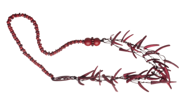 Colorful Tribal bead style necklet fly in air. Red Chilli color bead necklace as gemstone for fashion ornament decorative items. Fashion ornament necklace to add more style. White background isolated